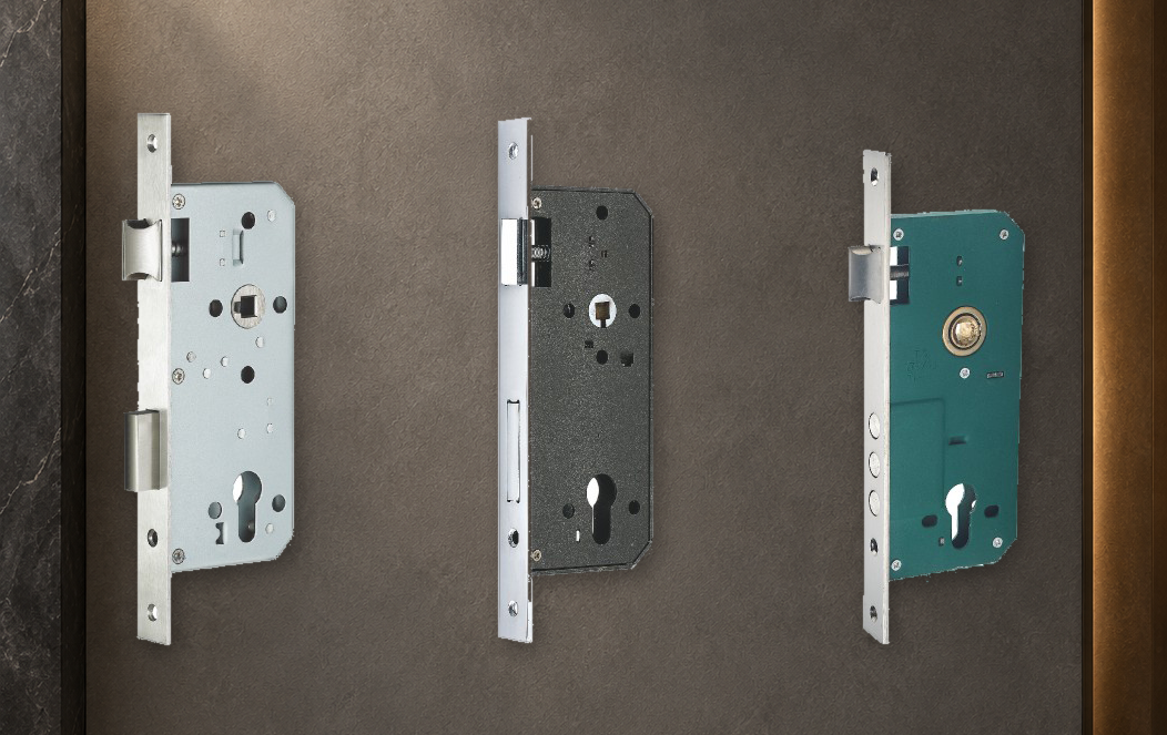 Three mortise lock bodies in different case finishes